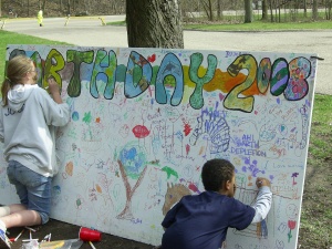 Kids decorate a banner at last year's festival